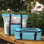 Teal mesh beach tote and detachable insulated cooler bag with beach items