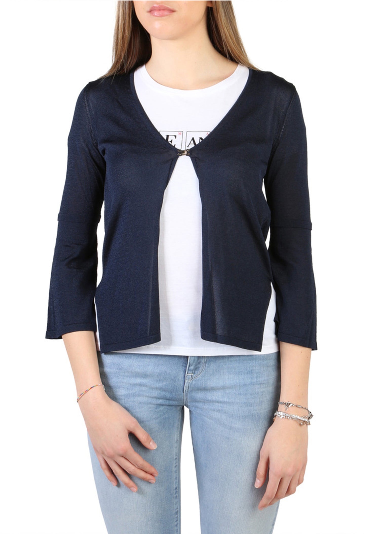 ArmaniJeansWomen Model wearing a navy blue cardigan over a white shirt with a visible brand logo.