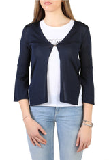 ArmaniJeansWomen Model wearing a navy blue cardigan over a white shirt with a visible brand logo.