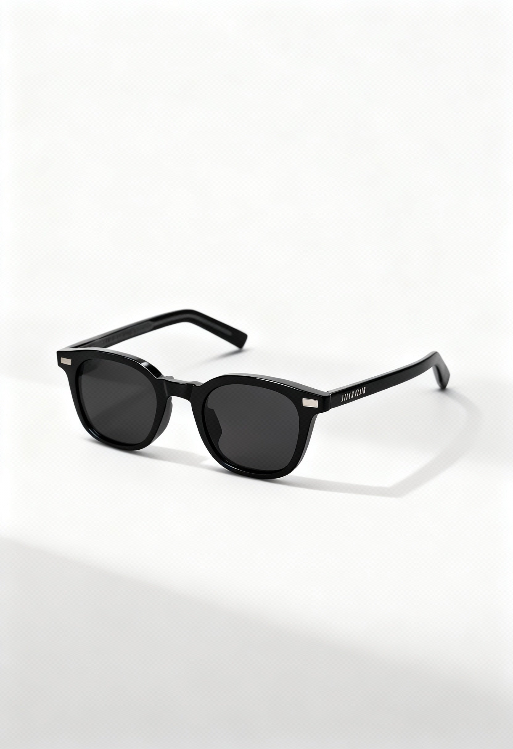 LatenzaZero Zenith unisex sunglasses with black acetate frame and UV3 lenses displayed on a white surface in natural light.

Image 2