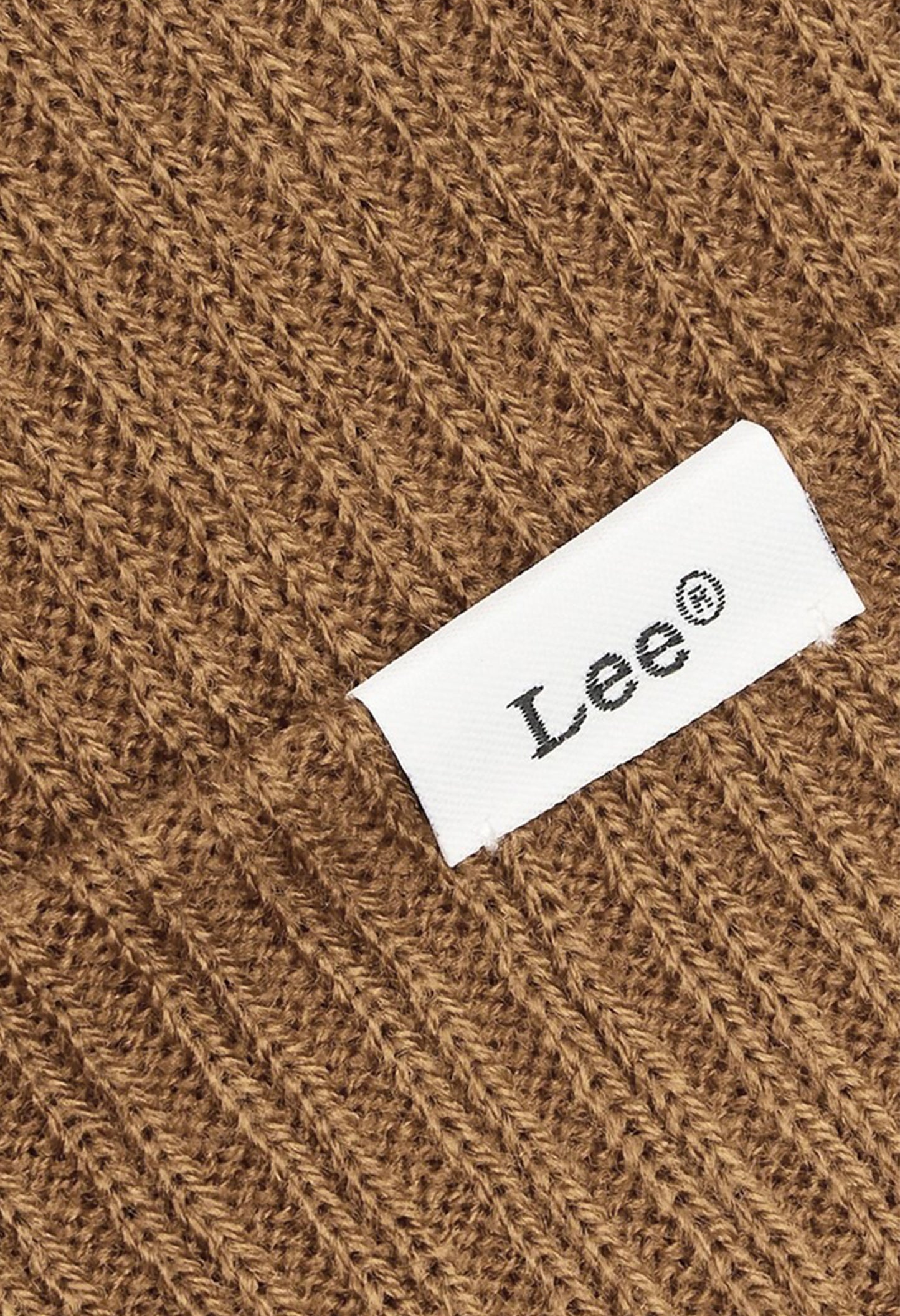 Close-up of Lee 112358302 beanie hat showing stitched ribbed texture and white Lee woven tag.