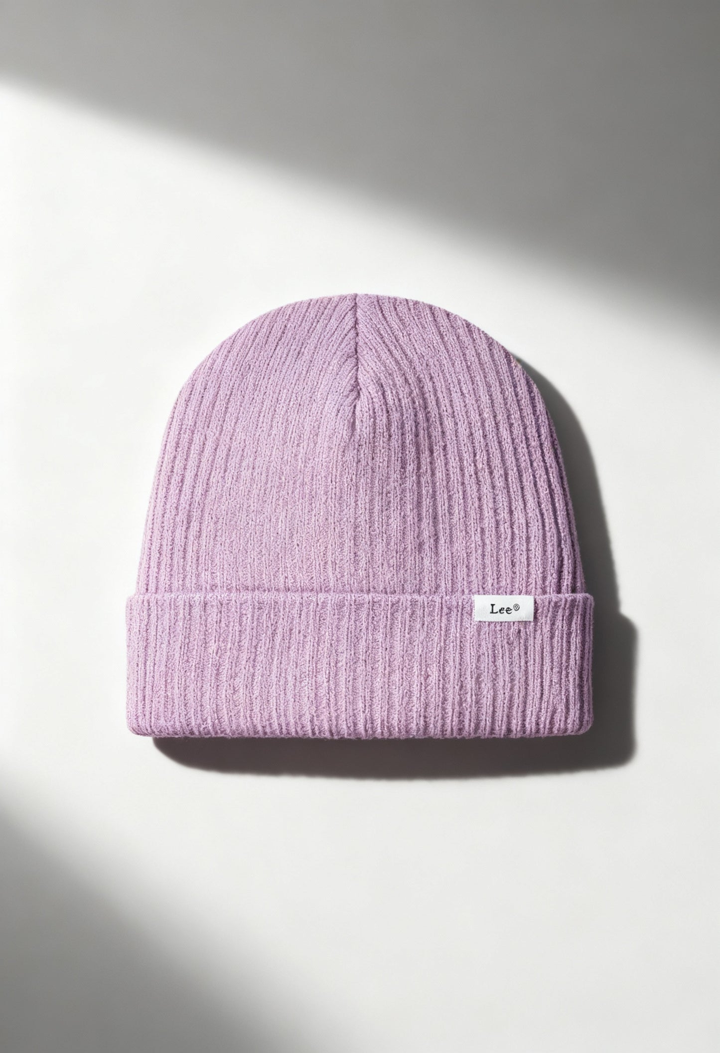 Lee 112358334 lilac ribbed knit women’s beanie hat with folded cuff and Lee logo, lit in bright studio light.