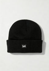 Lee LP594001 black unisex ribbed knit beanie hat with folded cuff and Lee logo, displayed in studio lighting.