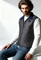Napapijri NP0A4ECC men's padded vest in dark grey, worn by model, showing slim fit.