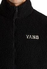 Close-up of Vans VN000NDUBLK1 fleece jacket showing textured fabric and embroidered Vans logo on chest.