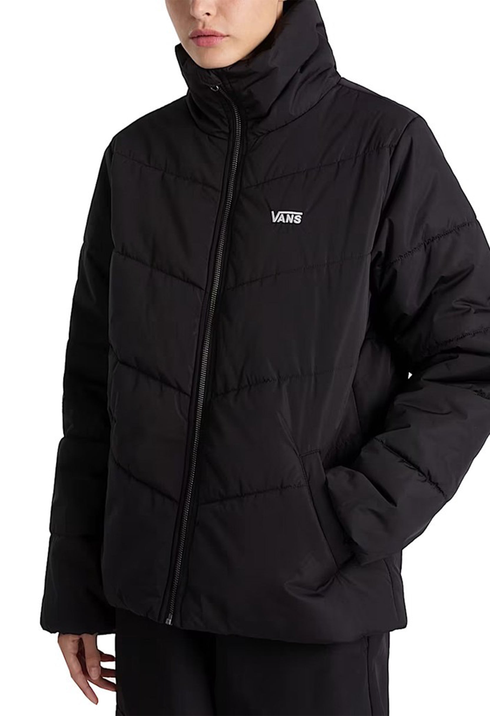 Front angled view of Vans VN0A7YK5BLK1 women’s bomber jacket showing padded texture and logo detail.