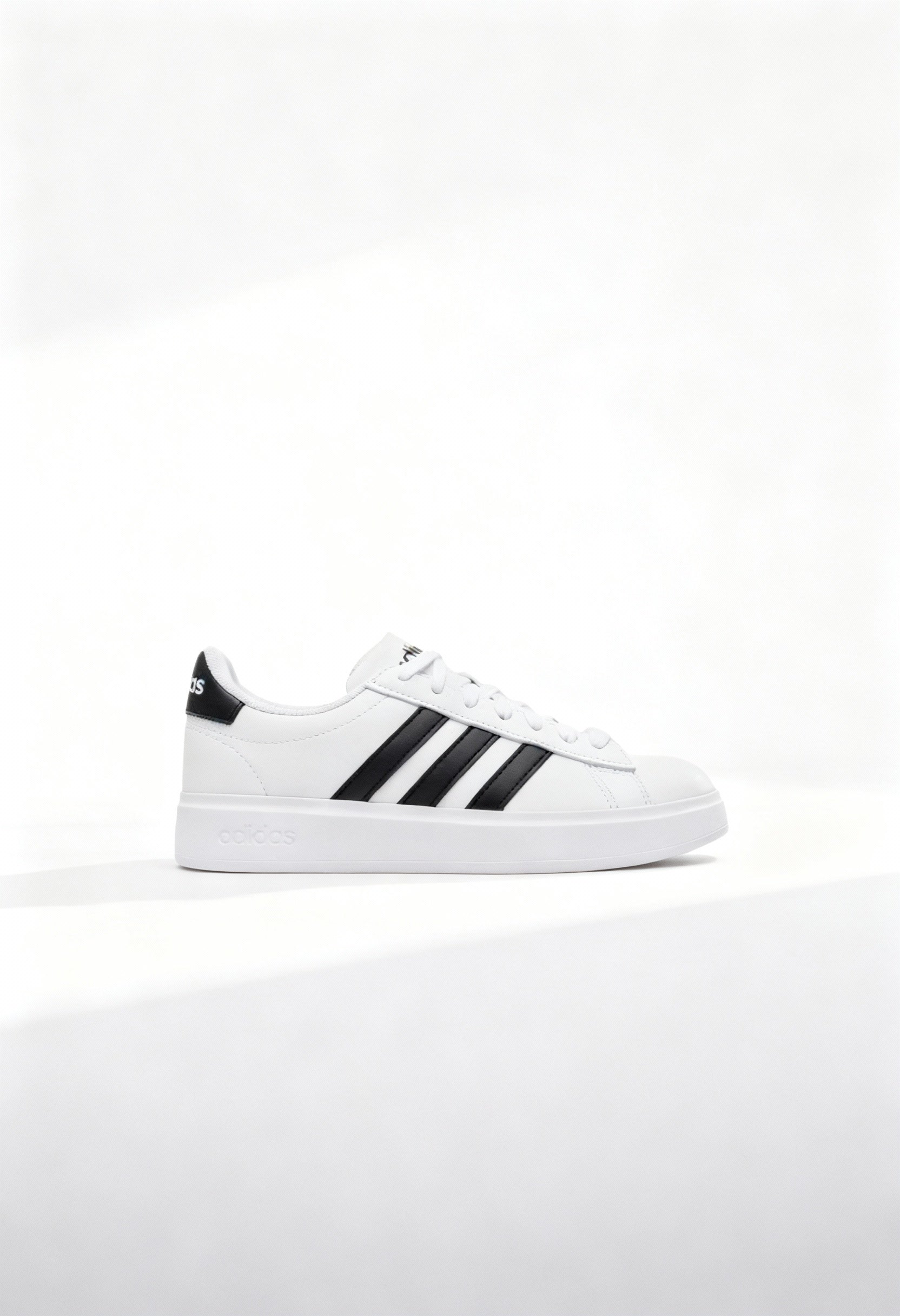 Brand new Adidas Grand Court 2.0 women's sneakers in core white with black 3-stripes side view.