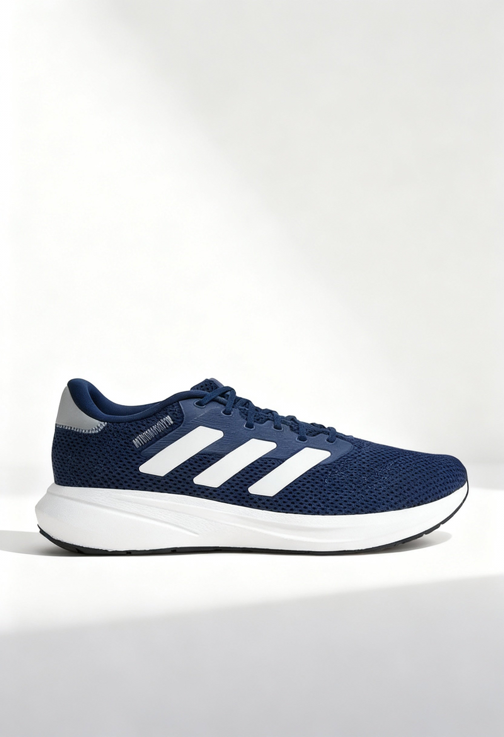 Brand new Adidas Response Runner U sneakers in blue with white 3-stripes side view.