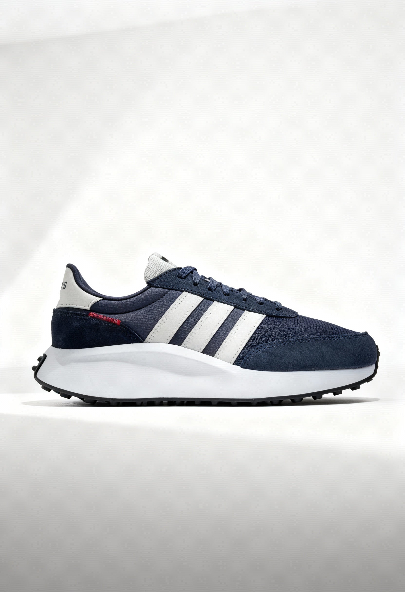 Brand new Adidas RUN 70S men's sneakers in navy blue with white 3-stripes side view.