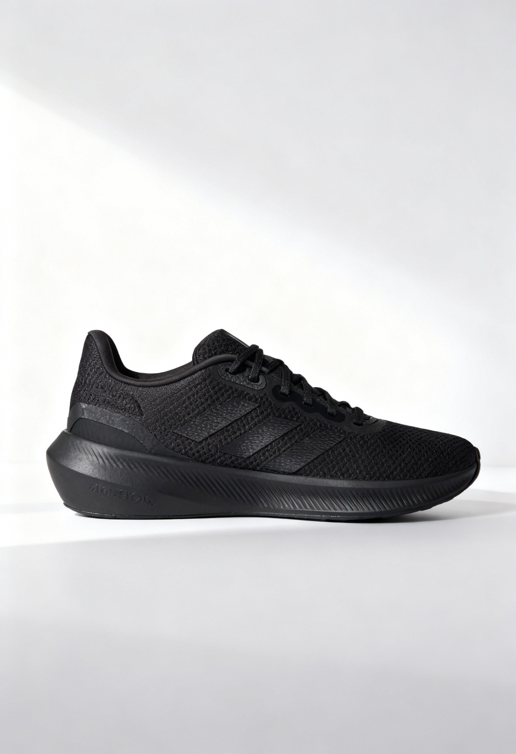 Brand new Adidas Runfalcon 3.0 men's running shoes in triple black side view.