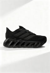 Brand new Adidas Switch FWD M men's running shoes in core black with unique midsole voids.