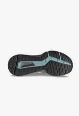 Traxion rubber outsole with hybrid multidirectional lugs on Adidas Terrex Soulstride for road and trail grip.