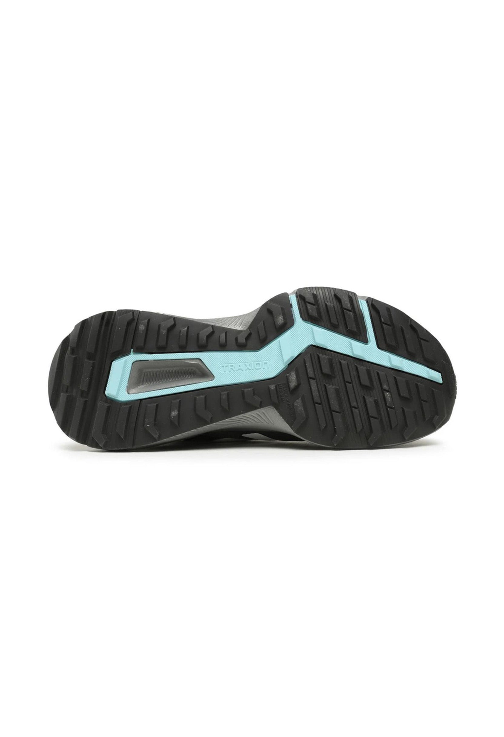 Traxion rubber outsole and hybrid tread pattern of the Adidas Terrex Soulstride for grip.