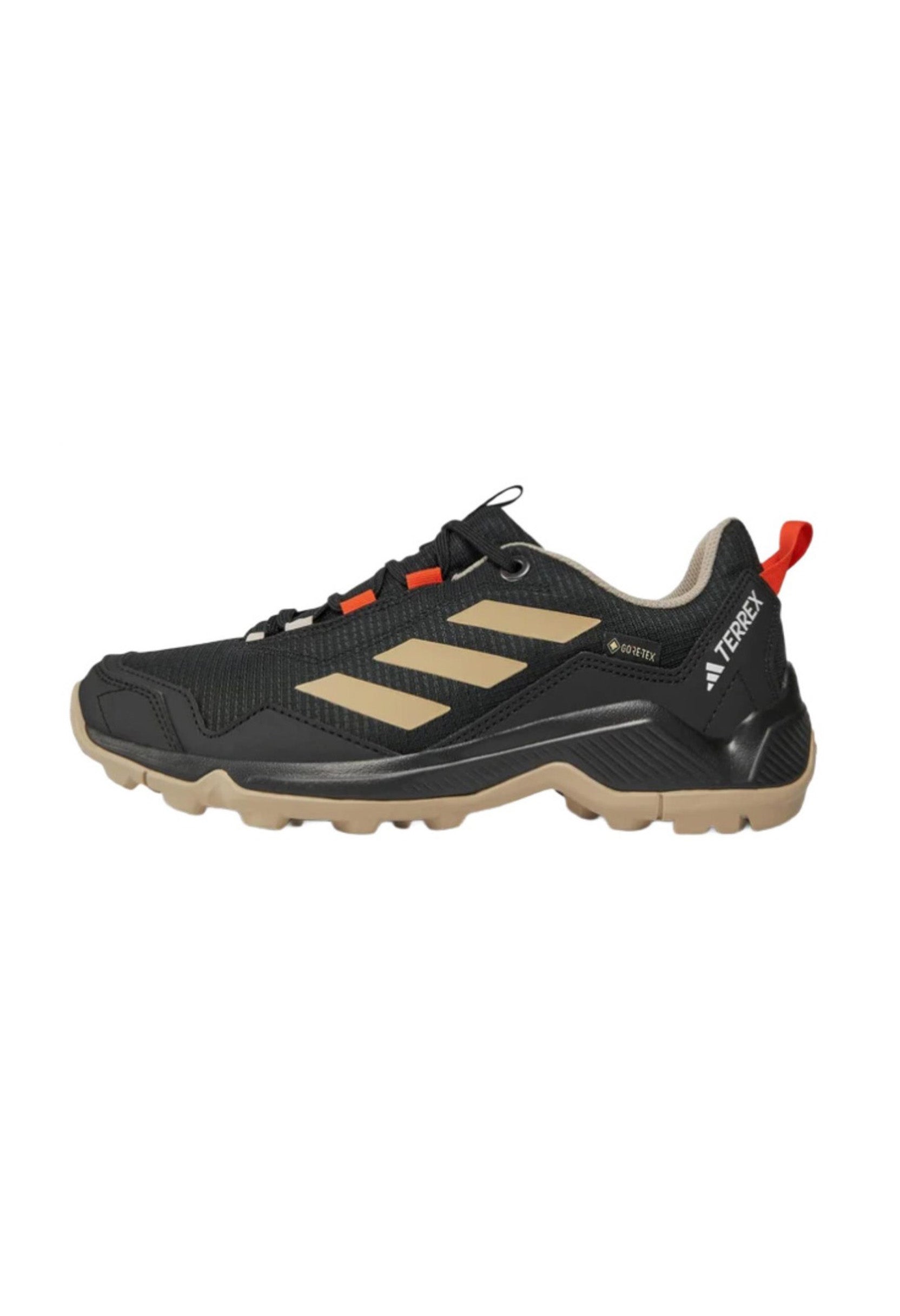 Side profile of authentic Adidas Terrex Eastrail GTX waterproof trail shoes showing the cushioned midsole.