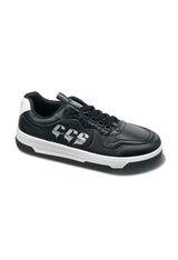 Authentic designer men's sneaker in black and white, side profile showing synthetic leather panels.