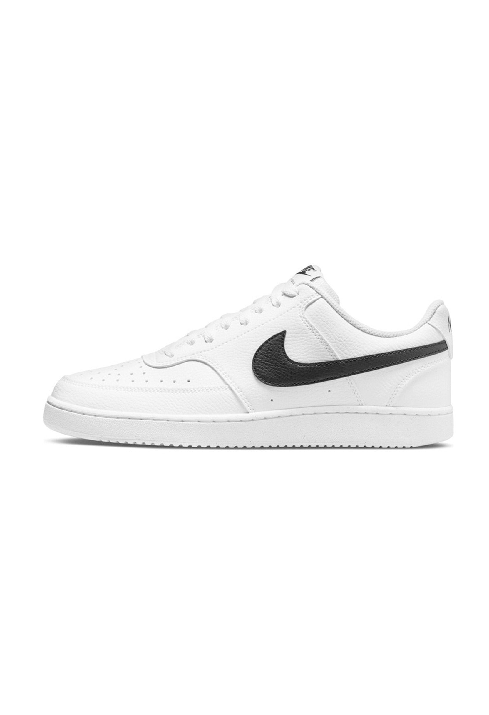 Side profile of authentic white Nike Court Vision Low shoes highlighting the retro silhouette.