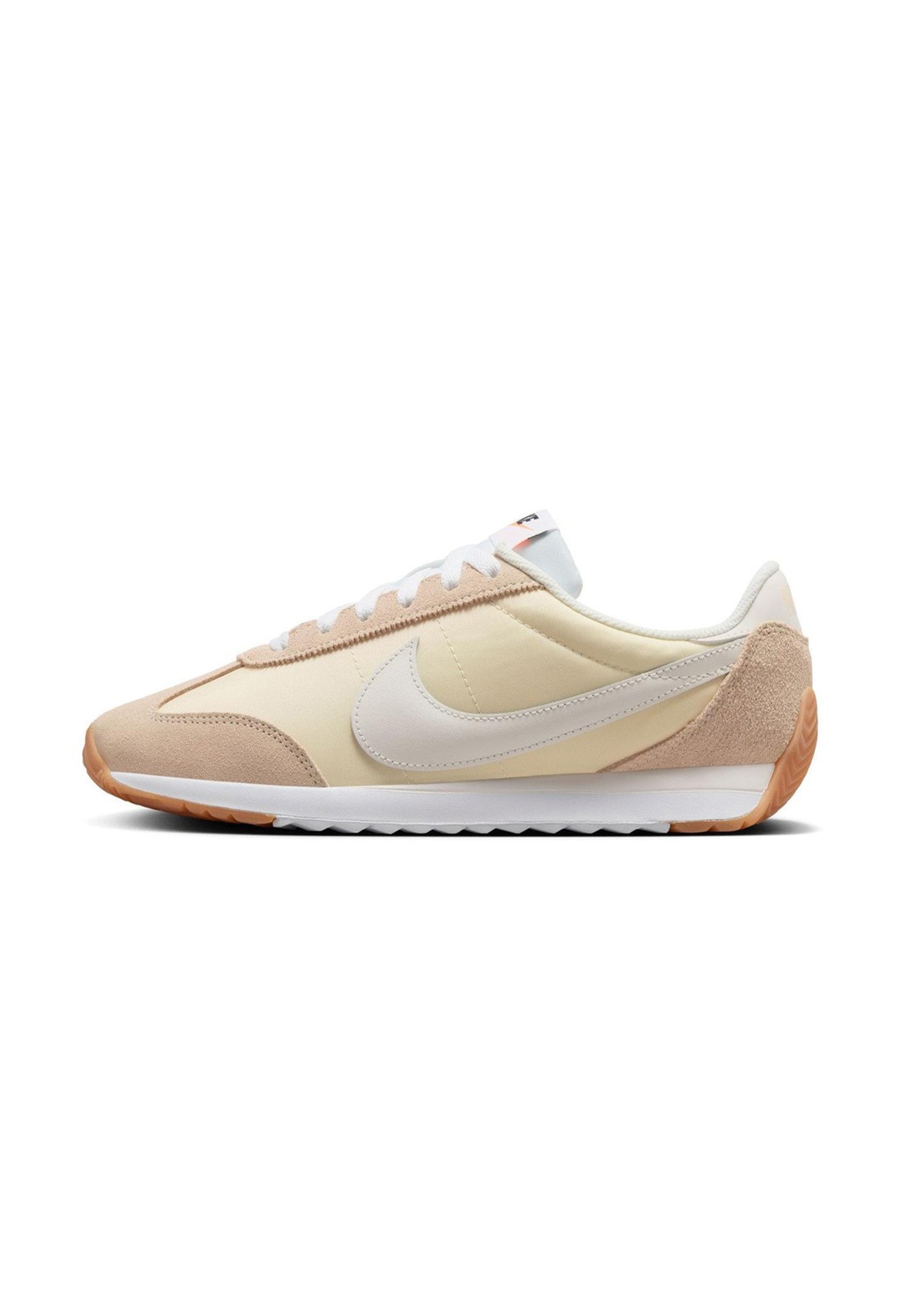 Side profile of authentic Nike Pacific shoes showing the retro-inspired slim silhouette.