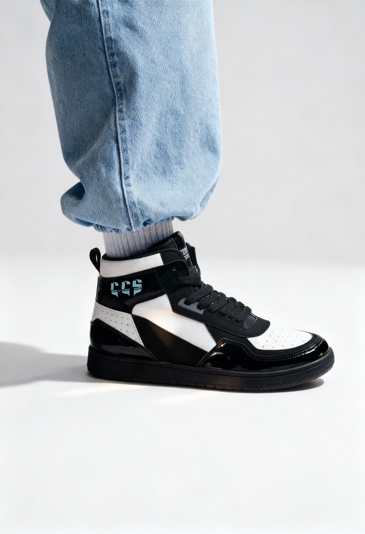 Cavalli Class CM8804 men's contrast panel sneaker, worn view, black and white design.