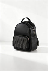 Front angle of the black Cult women’s backpack featuring a studded front pocket and structured design.