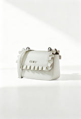 Front angle of the white Cult ruffled crossbody bag with flap design and structured silhouette.