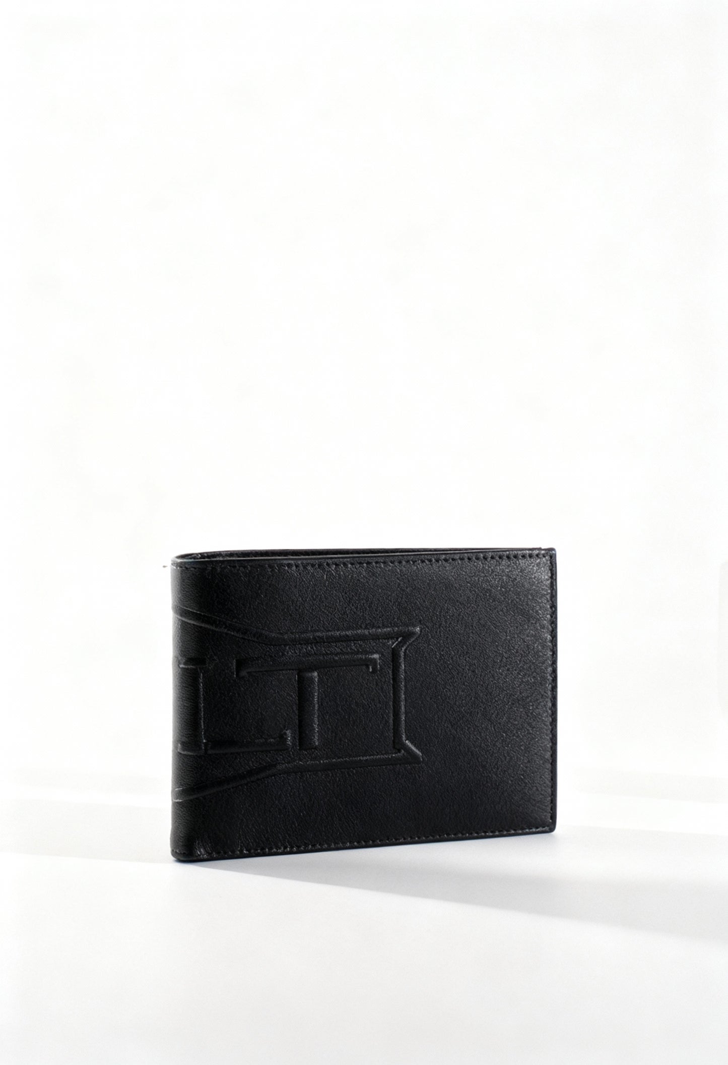 Cult X3EPMX203003 men's leather bifold wallet, compact design, front logo detail.