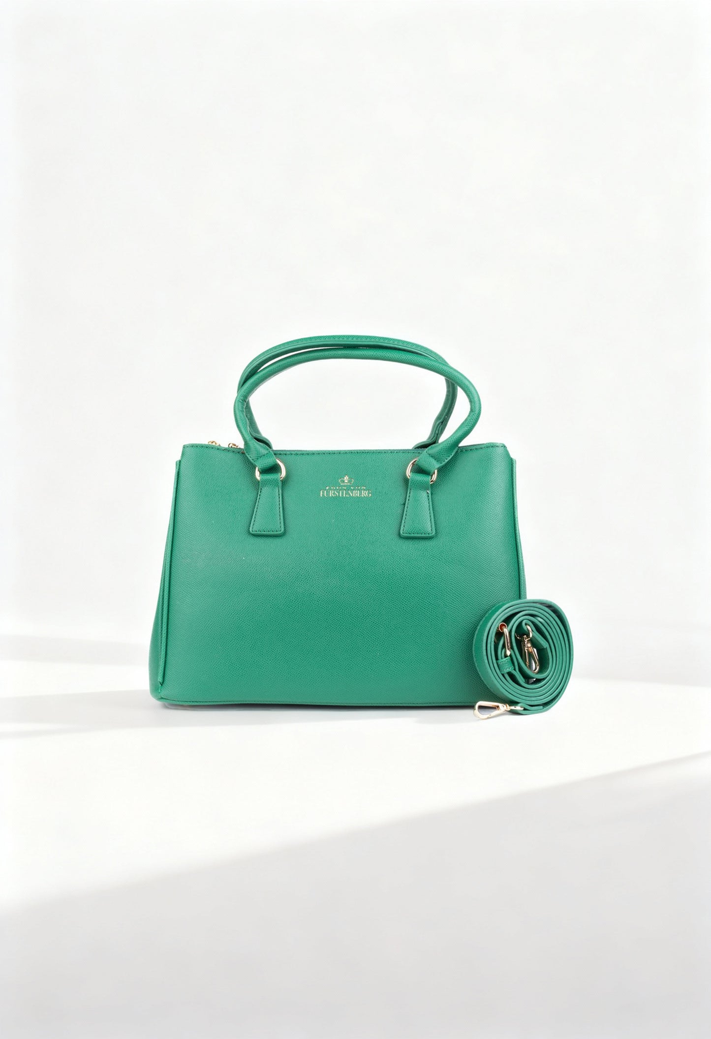 Front display of the green Egon Von Furstenberg Michelle shoulder bag with top handles.