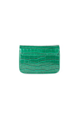 Back view of the green crocodile-effect Valery crossbody bag with a smooth structured finish.