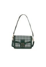 Front view of the green variation of the Alison Alison woman handbag showing the woven pattern.