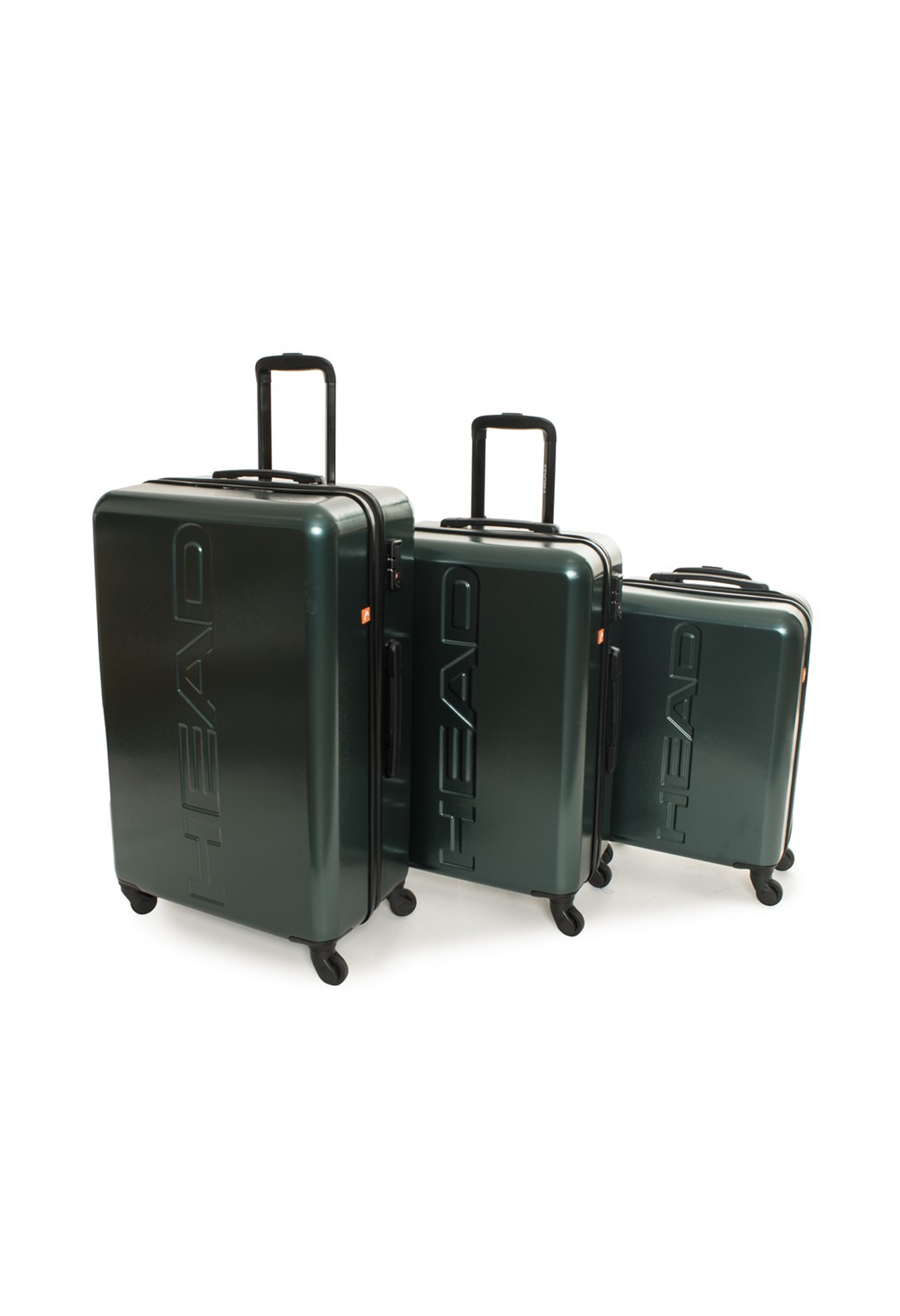 Side angle of the green Head hard-shell 3-piece luggage set showing spinner wheels.