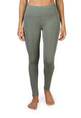 High-quality stretchy green activewear leggings, full-length shot.