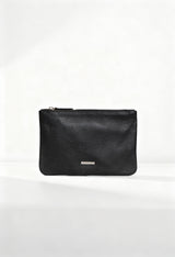 Front view of the Lamarthe TRE102 black textured leather clutch with metallic logo plate.