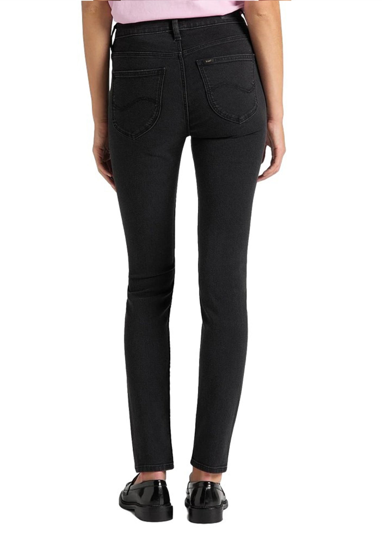 Back view of a woman wearing black Lee L626SHMY skinny jeans showing pockets and fit.