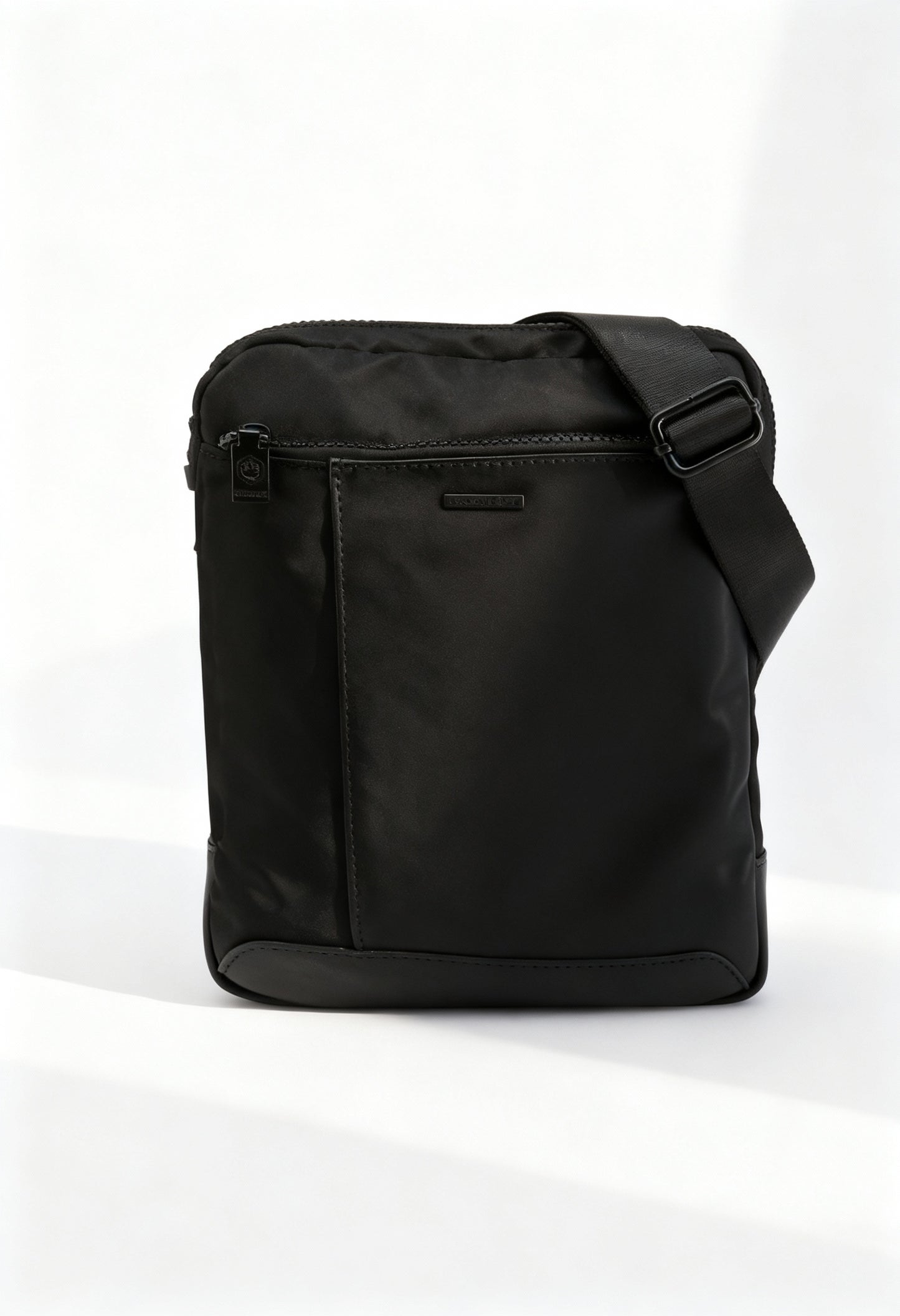 Lumberjack RYAN-LK3563 lightweight polyester across-body bag in dark gray/black.