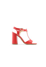 Side angle of the ARIANNA red patent block heel sandals highlighting the glossy finish.