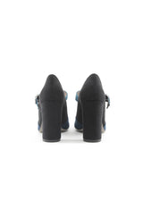 Back view of the GIORGIA two-tone courts showing the tall block heel design.