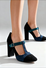 On-foot view of the Made in Italia GIORGIA two-tone block heel courts with teal buckle strap.