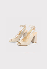 Angled pair view of the cream Made in Italia LINDA lace-up block heel sandals.