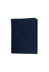 MCS unisex beach towel in navy, close-up folded view showing fabric texture.