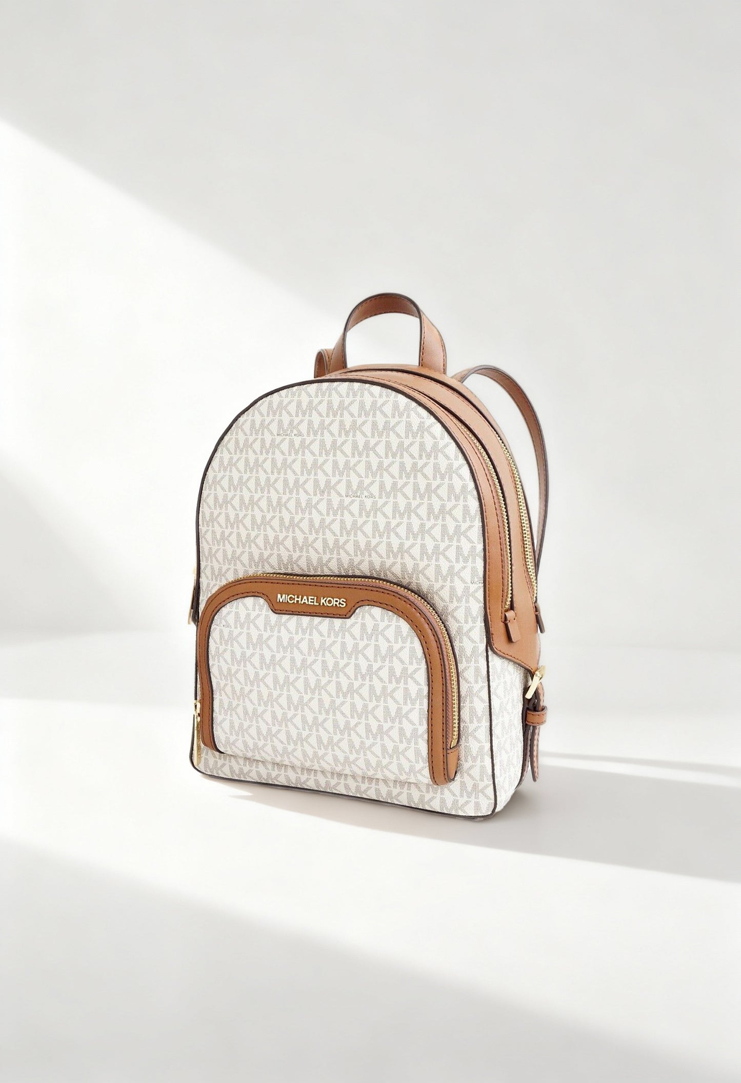 “Front view of Michael Kors Women’s Signature Logo Backpack 35S2G8TB2B – authentic designer backpack available at France AJ Luxe, featuring MK monogram and gold-tone details.”