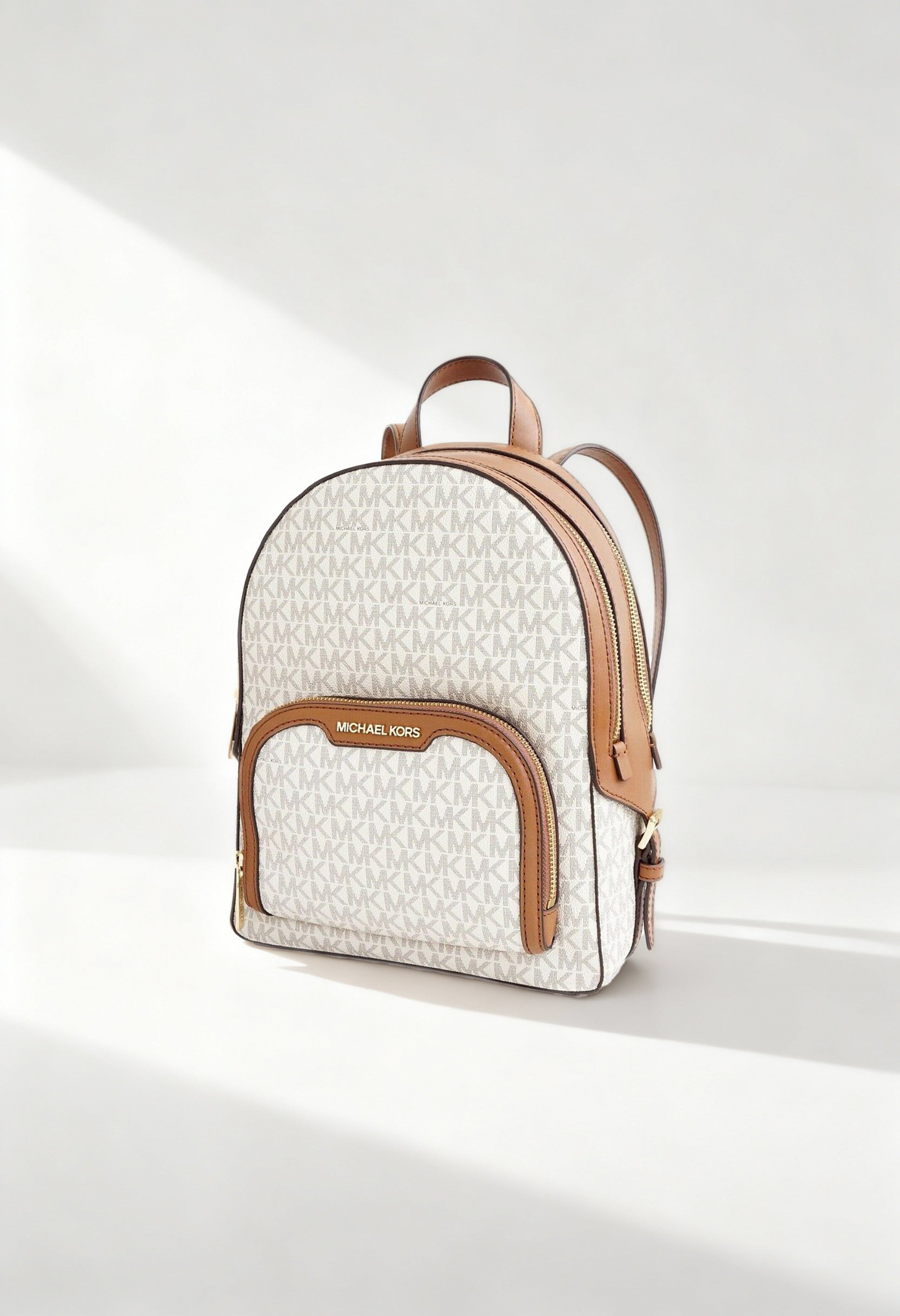 “Front view of Michael Kors Women’s Signature Logo Backpack 35S2G8TB2B – authentic designer backpack available at France AJ Luxe, featuring MK monogram and gold-tone details.”