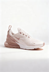 Brand new Nike Air Max 270 women's sneakers in soft pink side view.