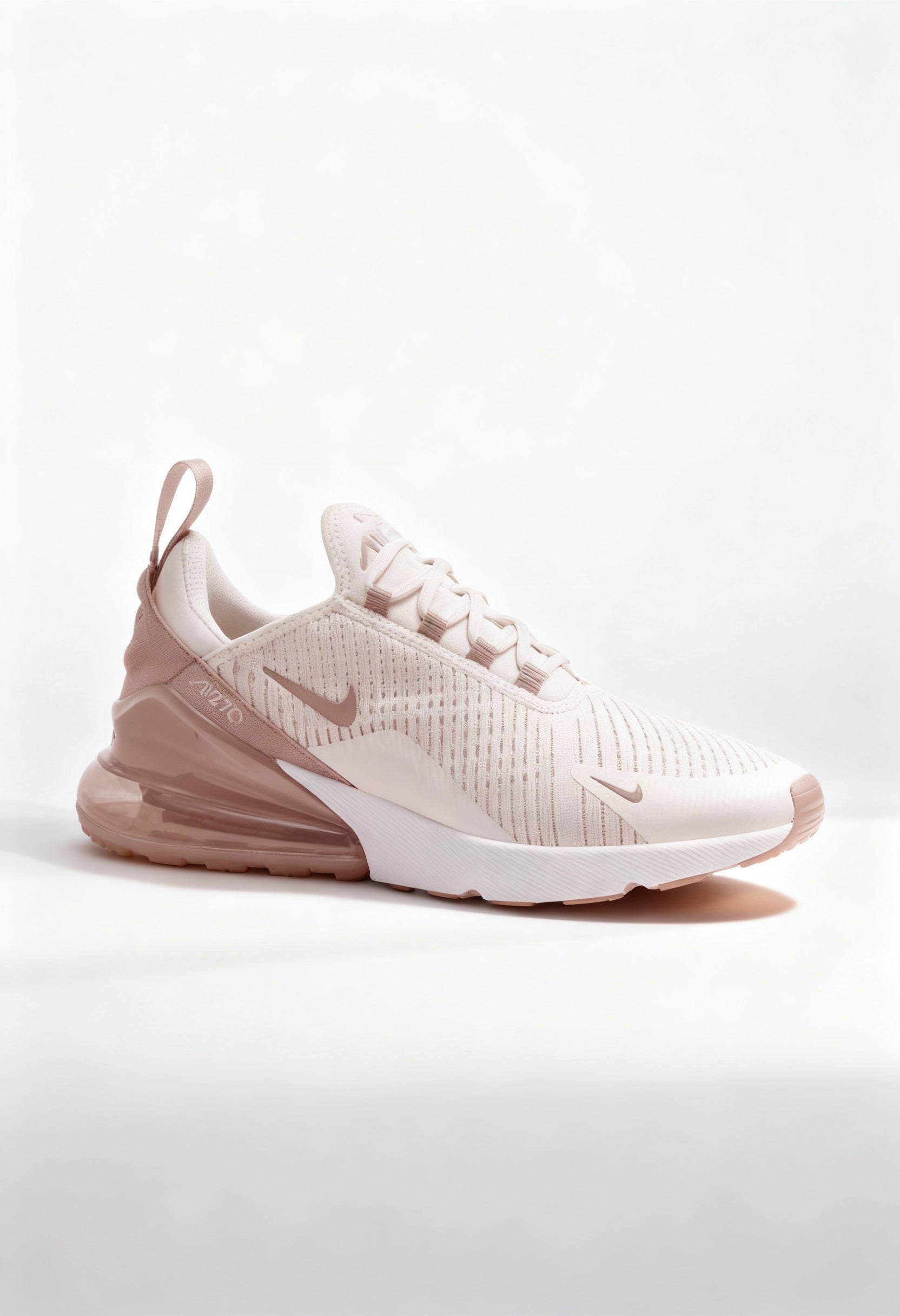 Brand new Nike Air Max 270 women's sneakers in soft pink side view.
