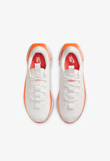 Top view of Nike Motiva walking sneakers highlighting the breathable mesh and laces.