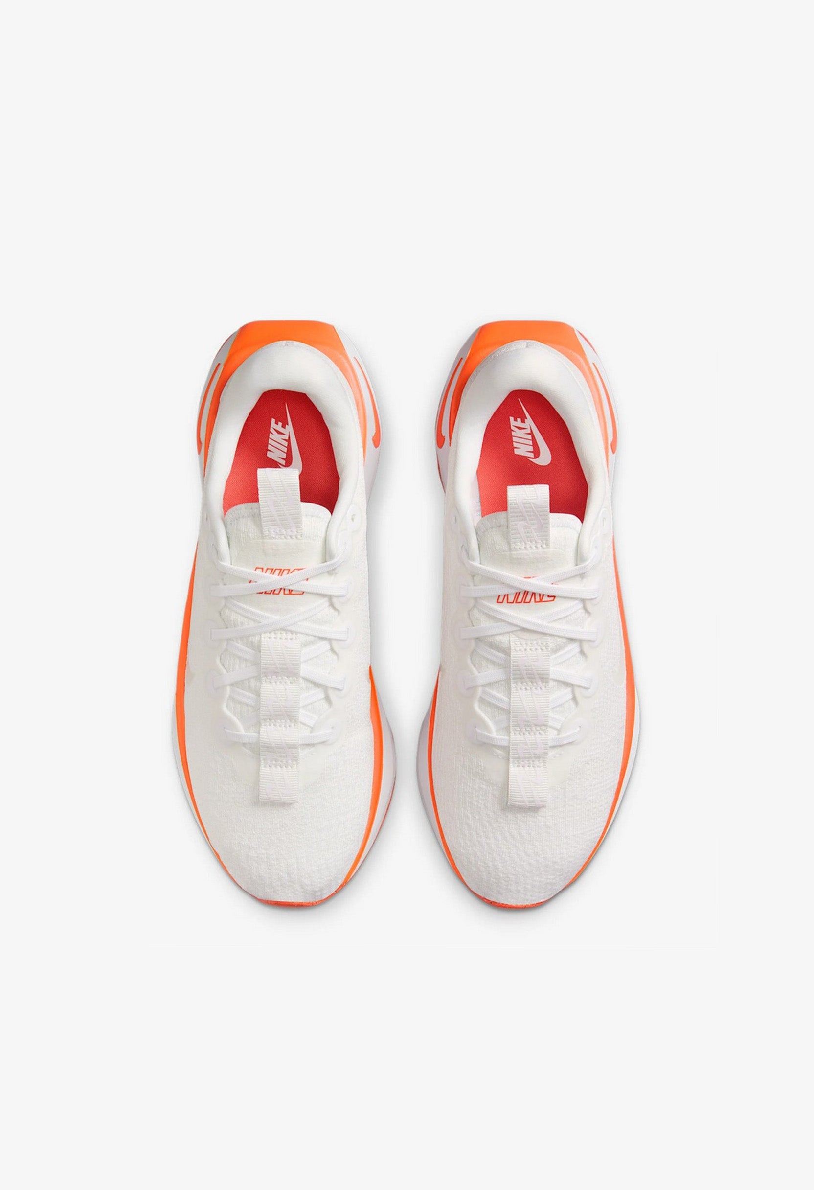 Top view of Nike Motiva walking sneakers highlighting the breathable mesh and laces.