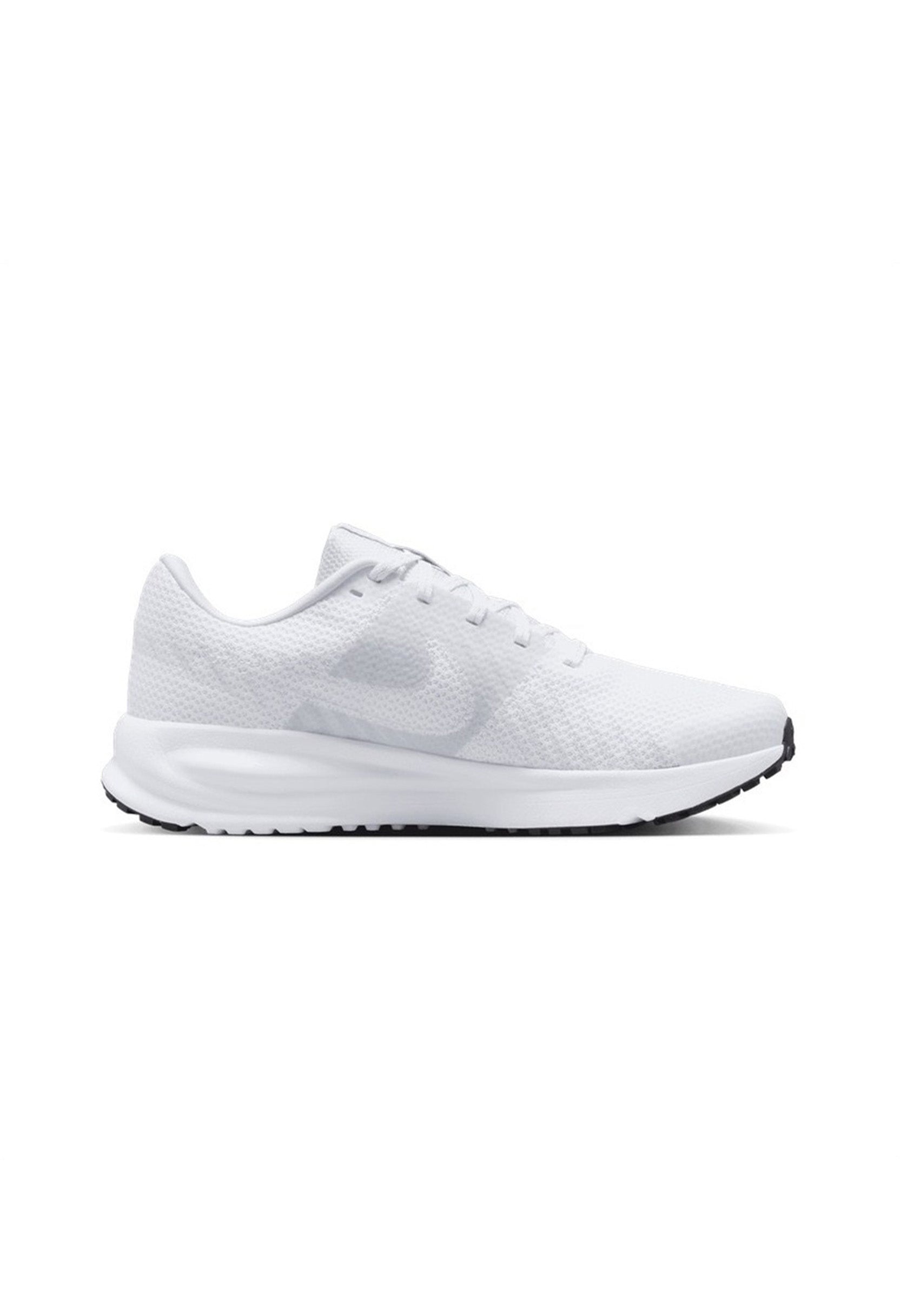 Nike Run Defy women's athletic trainers in the all-white color variant.