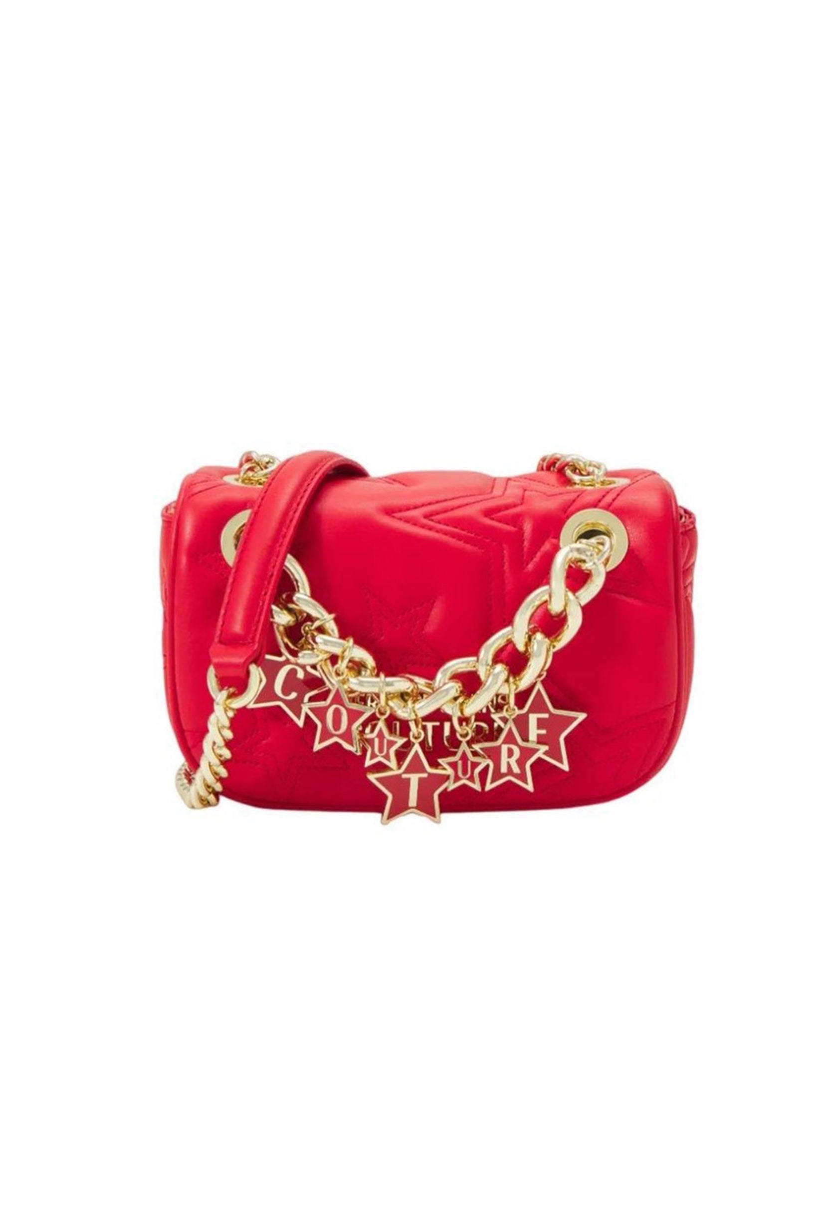 Side angle view of the red crossbody bag showing its slim structure and gold chain detail.