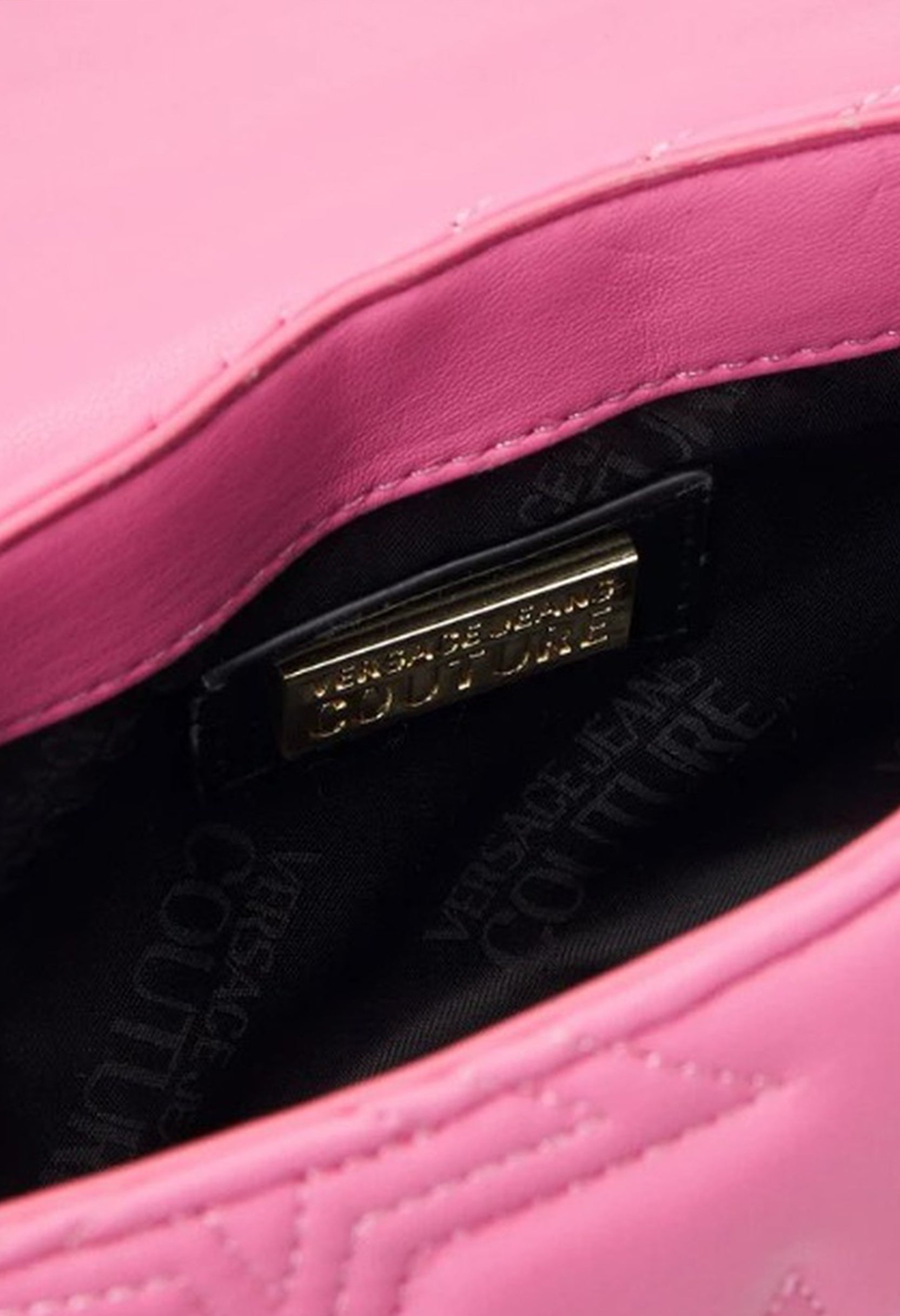 Interior shot of the Versace Jeans 75VA4BC1_ZS806 crossbody bag showing lining and logo plaque.